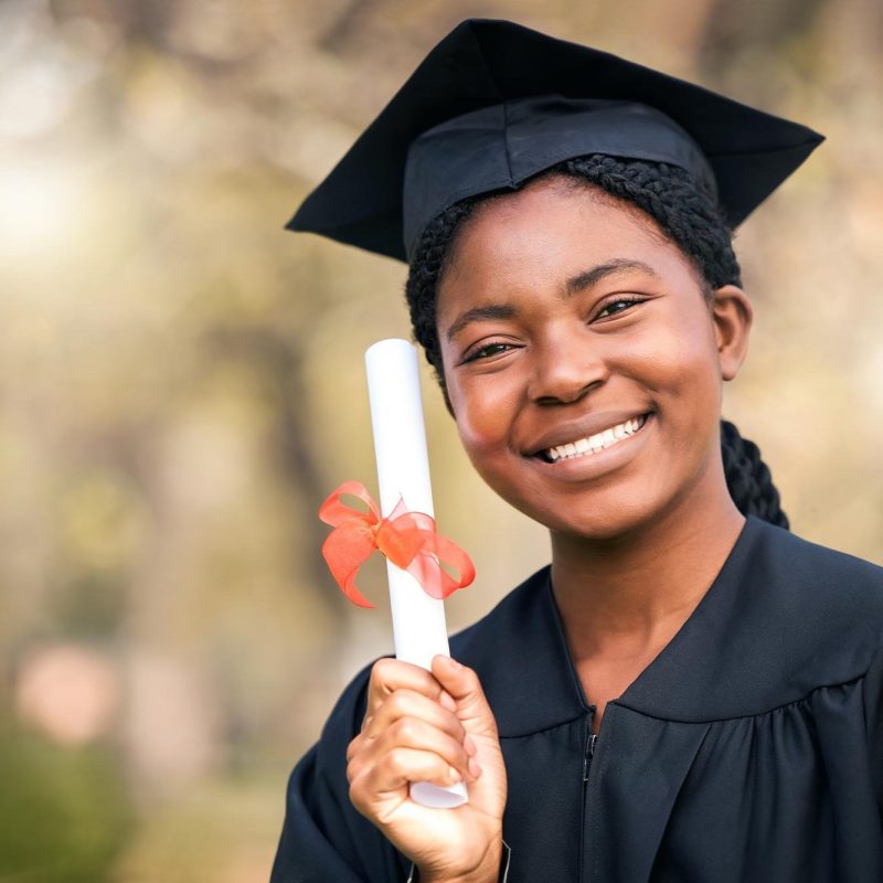 EDUCATION_my-ticket-straight-successful-career-portrait-young-woman-holding-her-diploma-graduation-day